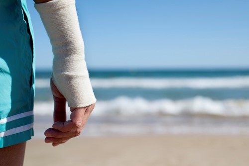 Injured Arm at the Beach